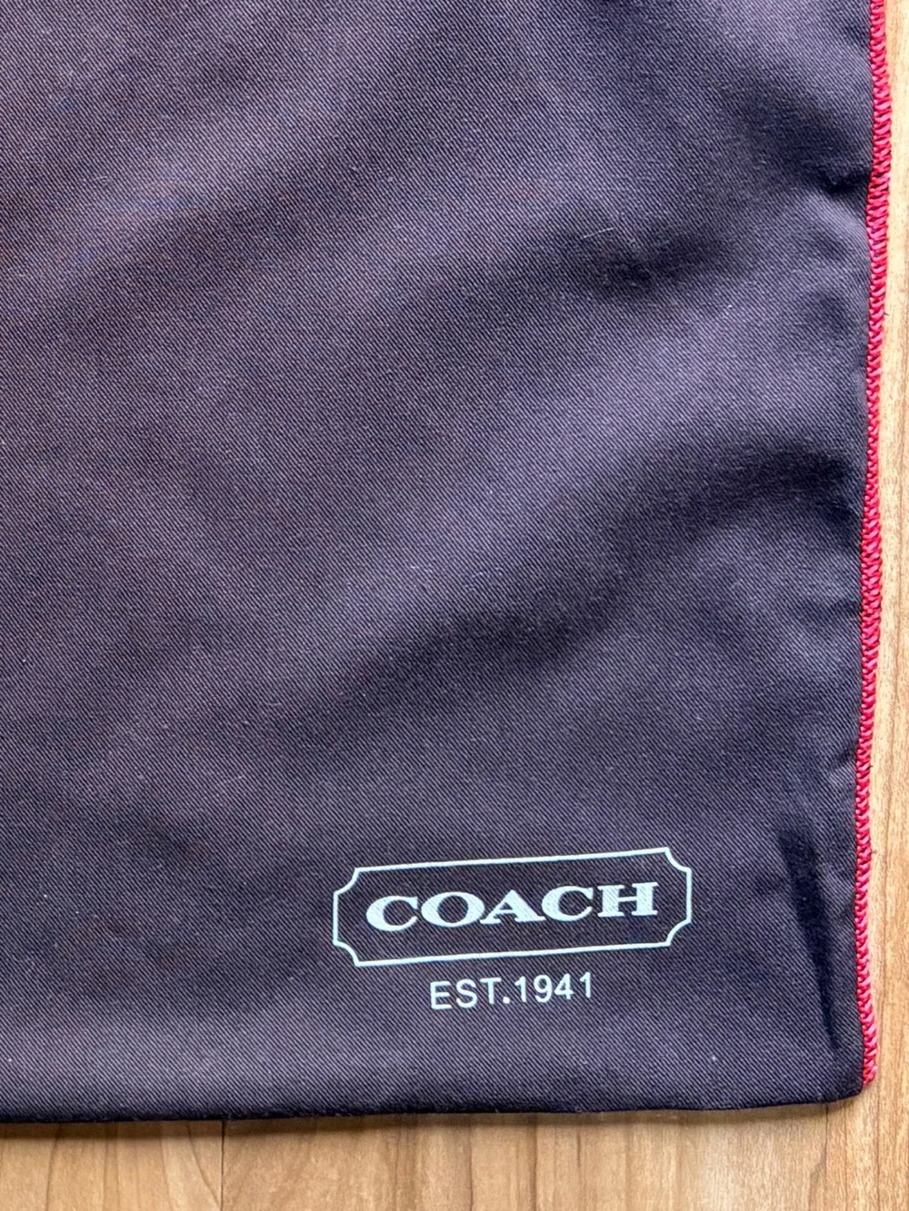 Coach branded dust